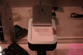 Illustration for article titled Splashpower Charger Lets You Charge Wirelessly, Lose That Wired Mess
